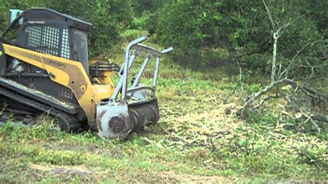 skid steer clearing trees|heavy duty land clearing equipment.